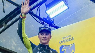 Dutch Jelte Krijnsen of Q36.5 Pro Cycling Team celebrates on the podium after winning the Druivenkoers one-day cycling race, 206,3 km from and to Overijse, on August 23, 2024. 
MARC GOYVAERTS / Belga / AFP