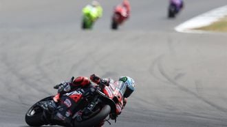 Aprilia Racing team's Italian MotoGP rider Marco Bezzecchi takes part in the MotoGP British Grand Prix at Silverstone circuit in Northamptonshire, central England, on May 25, 2025.  
Adrian Dennis / AFP