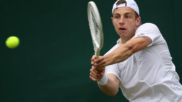 epa11455625 Tallon Griekspoor of the Netherlands in action against Miomir Kecmanovic of Serbia during their Mens Singles 2nd round match at the Wimbledon Championships, Wimbledon, Britain, 03 July 2024.  EPA/TIM IRELAND  EDITORIAL USE ONLY