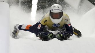 epa11120993 Kimberley Bos of Netherlands crosses the finish line during the women's Skeleton race at the IBSF Bob & Skeleton World Cup in Sigulda, Latvia, 02 February 2024.  EPA/TOMS KALNINS