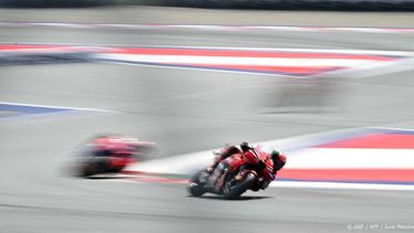 Ducati Lenovo Team's Italian rider Francesco Bagnaia (R) competes in the Austrian MotoGP race at the Red Bull Ring in Spielberg, Austria on August 18, 2024.  
Jure Makovec / AFP