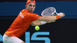 Netherlands' Tallon Griekspoor returns a shot to Italy's Jannik Sinner during their final singles match between Italy and Netherlands at the Davis Cup Finals at the Palacio de Deportes Jose Maria Martin Carpena arena in Malaga, southern Spain, on November 24, 2024. 
Thomas COEX / AFP
