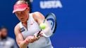 Netherlands' Suzan Lamens plays a return to Poland's Iga Swiatek during their women's singles second round tennis match on day five of the US Open tennis tournament at the USTA Billie Jean King National Tennis Center in New York City, on August 28, 2025. 
Kena Betancur / AFP