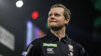 epa11031761 Kevin Doets of The Netherlands reacts after losing against Michael Smith of England (not pictured) during the opening session of the Paddy Power World Darts Championship at Alexandra Palace in London, Britain, 15 December 2023.  EPA/TOLGA AKMEN