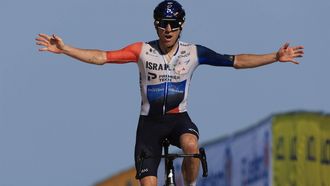 2023-07-09 18:00:33 epa10736373 Canadian rider Michael Woods of team Israel-Premier Tech celebrates as he crosses the finish line to win the 9th stage of the Tour de France 2023, a 184kms race from Saint-Leonard-de-Noblat to Puy de Dome, France, 09 July 2023.  EPA/MARTIN DIVISEK