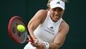 Germany's Angelique Kerber returns against Kazakhstan's Yulia Putintseva during their women's singles tennis match on the second day of the 2024 Wimbledon Championships at The All England Lawn Tennis and Croquet Club in Wimbledon, southwest London, on July 2, 2024. 
HENRY NICHOLLS / AFP