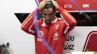 2023-11-17 03:16:19 epa10980455 Scuderia Ferrari driver Carlos Sainz Jr. of Spain looks at his car prior to a practice session for the Formula 1 Las Vegas Grand Prix, in Las Vegas, USA, 17 November 2023. The Formula 1 Las Vegas Grand Prix is held at the Las Vegas Strip Circuit on 18 November 2023.  EPA/ETIENNE LAURENT