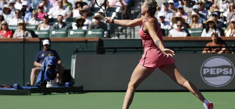 epa12809831 Aryna Sabalenka of Belarus in action during the women's singles match against Naomi Osaka of Japan on day 7 of the BNP Paribas Open tennis tournament in Indian Wells, California, USA, 10 March 2026.  EPA/JOHN G. MABANGLO