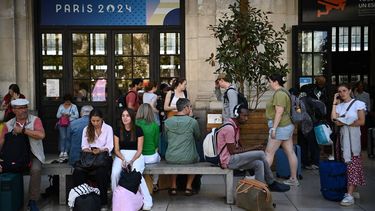 Passengers wait for their train departures at the Bordeaux-Saint-Jean train station in Bordeaux, western France on July 26, 2024, as France's high-speed rail network was hit by an attack disrupting the transport system, hours before the opening ceremony of the Paris 2024 Olympic Games. According to the French railway company SNCF, a massive attack on a large scale hit the high speed train network (TGV) on July 26, 2024, and many routes will have to be cancelled. The SNCF urged passengers to postpone their trips and stay away from train stations.
Christophe ARCHAMBAULT / AFP