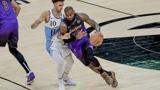 epa11761437 Los Angeles Lakers forward LeBron James (R) in action against Atlanta Hawks forward Zaccharie Risacher of France during the second half of an NBA game in Atlanta, Georgia, USA, 06 December 2024.  EPA/ERIK S. LESSER SHUTTERSTOCK OUT