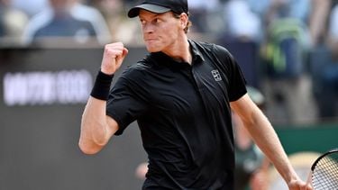 Italy's Jannik Sinner celebrates after winning against Italy's Andrea Pellegrino during the ATP Rome Open tennis tournament at Foro Italico in Rome on May 12, 2026.  
Tiziana FABI / AFP