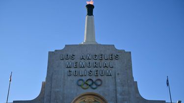 The LA28 Olympic cauldron is lit during a ceremonial lighting at the Memorial Coliseum in Los Angeles on January 13, 2026, ahead of the launch of ticket registration for the 2028 Summer Olympic Games. 
Frederic J. Brown / AFP