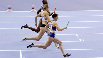 epa11519973 (top to bottom) Shamier Little of the USA, Marika Popowicz-Drapala and Louise Maraval of France compete in the 4x400m Relay Mixed heats in the Athletics competitions in the Paris 2024 Olympic Games, at the Stade de France stadium in Saint Denis, France, 02 August 2024.  EPA/RONALD WITTEK