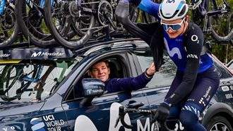 2023-04-02 12:03:37 Denmark's Mathias Norsgaard (R) of Movistar Team rides next  to Movistar Team sports director Jurgen Roelandts   during the men's Tour of Flanders one day cycling event, 273,4km from Bruges to Oudenaarde, on April 2, 2023.  
DIRK WAEM / Belga / AFP