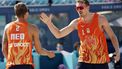 Netherlands' #01 Stefan Boermans and Netherlands' #02 Yorick De Groot celebrate a point in the men's pool F beach volleyball match between Netherlands and Spain during the Paris 2024 Olympic Games at the Eiffel Tower Stadium in Paris on July 29, 2024. 
Luis TATO / AFP