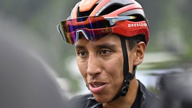epa11409789 Ineos Grenadier rider Egan Bernal of Colombia reacts after crossing the finish line during the sixth stage of the Tour de Suisse, a 42.5km cycling race from Ulrichen to Blatten-Belalp, Switzerland, 14 June 2024.  EPA/GIAN EHRENZELLER
