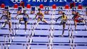 PARIJS - Maayke Tjin-a-Lim (M) in actie op de 100 meter horden (vrouwen) tijdens de olympische atletiekwedstrijden. ANP IRIS VAN DEN BROEK