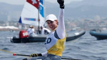 epa11533192 Gold medalist Marit Bouwmeester of the Netherlands celebrates after the Women's Dinghy Medal Race of the Sailing competitions in the Paris 2024 Olympic Games, at the Marseille Marina in Marseille, France, 07 August 2024.  EPA/OLIVIER HOSLET