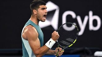 epa11821734 Carlos Alcaraz of Spain celebrates a point during his round 1 match against Alexander Shevchenko of Kazakhstan at the 2025 Australian Open in Melbourne, Australia, 13 January 2025.  EPA/LUKAS COCH AUSTRALIA AND NEW ZEALAND OUT