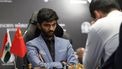 epa11771894 Chess grandmasters Gukesh Dommaraju (facing) of India and Ding Liren of China compete in Game 14 of the FIDE World Chess Championship in Singapore, 12 December 2024.  EPA/HOW HWEE YOUNG