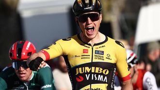 Jumbo-Visma's Dutch rider Olav Kooij celebrates as he crosses the finish line to win the 5th stage's of the 81st Paris - Nice cycling race, 212,5 km between Saint-Symphorien-sur-Coise and Saint-Paul-Trois-Chateaux, on March 9, 2023. 
Anne-Christine POUJOULAT / AFP