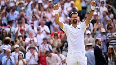 Serbia's Novak Djokovic celebrates winning against Russia's Roman Safiullin during their men's singles round of 16 tennis match on the seventh day of the 2026 Wimbledon Championships at The All England Lawn Tennis and Croquet Club in Wimbledon, southwest London, on July 5, 2026. 
Kirill KUDRYAVTSEV / AFP
