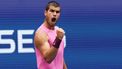 Spain's Carlos Alcaraz reacts to a point to Serbia's Novak Djokovic during their men's singles semifinal tennis match on day thirteen of the US Open tennis tournament at the USTA Billie Jean King National Tennis Center in New York City, on September 5, 2025. 
TIMOTHY A. CLARY / AFP