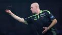 epa12610360 Michael van Gerwen of the Netherlands throws against Ireland’s William O'Connor during his second round World Darts Championships match at Alexandra Palace in London, Britain, 23 December 2025. The sporting event runs from 11 December 2025 to 03 January 2026.  EPA/ANDY RAIN