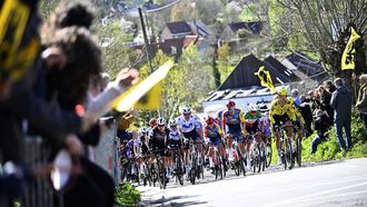 The pack of riders (peloton) cycles during the women's race of the 'Ronde van Vlaanderen/ Tour des Flandres/ Tour of Flanders' UCI WorldTour one day cycling race, 164,1 km with start and finish in Oudenaarde, on April 5, 2026. 
JASPER JACOBS / Belga / AFP