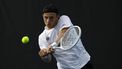 epa11086640 Tallon Griekspoor of the Netherlands in action against Arthur Fils of France during their Men's second round match at the Australian Open tennis tournament in Melbourne, Australia, 18 January 2024.  EPA/MAST IRHAM