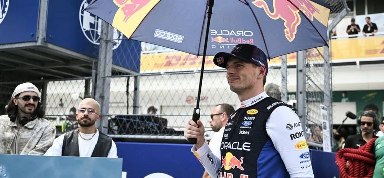 Red Bull Racing's Dutch driver Max Verstappen arrives at the starting grid for the 2026 Miami Formula One Sprint at Miami International Autodrome in Miami Gardens, Florida, on May 2, 2026.  
CHANDAN KHANNA / AFP