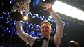 England's Kyren Wilson celebrates with the trophy after victory over Wales' Jak Jones on day two of their World Championship Snooker final at The Crucible in Sheffield, northern England on May 6, 2024.  Wilson won the final 18-14.
Oli SCARFF / AFP