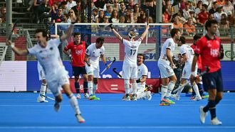 Germany's players celebrate after winning the 2026 FIH Men's Hockey World Cup Final match between Spain and Germany at the Belfius Hockey Arena in Wavre on August 30, 2026. 
DIRK WAEM / BELGA / AFP
