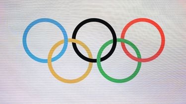 The photograph shows Olympic Rings during a ceremony to mark one year until the start of Milano Cortina Olympics in Strehler Theatre, in Milan, on February 6, 2025, ahead of the Milano Cortina 2026 Winter Olympic and Paralympic Games. 
MARCO BERTORELLO / AFP