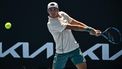 France's Arthur Cazaux hits a return against Serbia's Laslo Djere during their men's singles match on day three of the Australian Open tennis tournament in Melbourne on January 16, 2024. 
Lillian SUWANRUMPHA / AFP