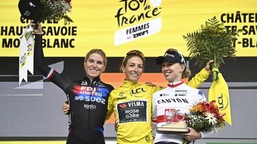 (From L) Second-placed FDJ-SUEZ team's Dutch rider Demi Vollering, overall winner Team Visma | Lease a Bike's French rider Pauline Ferrand-Prevot and third-placed Canyon//SRAM Racing team's Polish rider Katarzyna Niewiadoma celebrate on the podium after the 9th and last stage of the fourth edition of the Women's Tour de France cycling race at the end of the 9th and final stage (out of 9) 124.1 km from Praz-sur-Arly to Chatel, in Chatel, eastern France on August 3, 2025. 
JULIEN DE ROSA / AFP