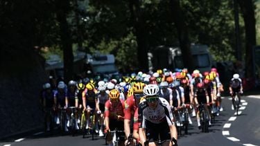 The pack of riders (peloton) cycles in the Col d'Aspin ascent during the 6th stage of the 113th edition of the Tour de France cycling race, 186,2 km between Pau and Gavarnie-Gèdre in the French Pyrenees, on July 9, 2026. 
Anne-Christine POUJOULAT / AFP