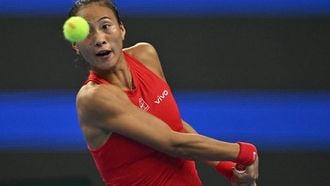China's Zheng Qinwen hits a return to Russia's Mirra Andreeva during their women's singles final at the China Open tennis tournament in Beijing on October 11, 2026. 
Pedro Pardo / AFP