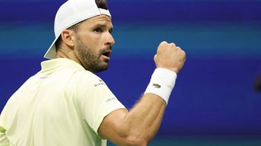 Bulgaria's Grigor Dimitrov reacts as he plays against USA's Frances Tiafoe during their men's quarterfinals match on day nine of the US Open tennis tournament at the USTA Billie Jean King National Tennis Center in New York City, on September 3, 2024. 
CHARLY TRIBALLEAU / AFP