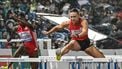 Netherlands' Nadine Visser (R) competes in  the women's 100m hurdles event of the IAAF Diamond League athletics meeting 