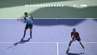2023-10-11 22:02:44 Netherlands' Wesley Koolhof (R) and Britain’s Neal Skupski play a point against France’s Sadio Doumbia and Fabien Reboul during their men's doubles quarter-final match at the Shanghai Masters tennis tournament on October 12, 2023. 
WANG Zhao / AFP