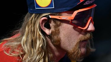 Team Lidl-Trek's US rider Quinn Simmons prepares before the 19th one-day classic 'Strade Bianche' (White Roads) cycling race between Siena and Siena, Tuscany, on March 8, 2025. 
Marco BERTORELLO / AFP
