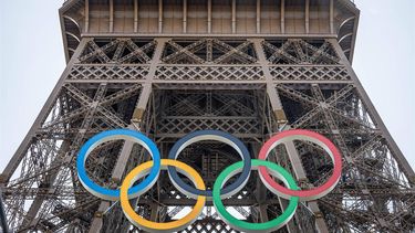 epa11487629 The Eiffel Tower is decorated with the Olympic Rings in Paris, France, 19 July 2024. From 18 to 26 July, the day of the Opening Ceremony of the Paris 2024 Olympic Games, security measures will be put in place in the French capital along the Seine river's banks and quays ahead of the main event. The Summer Olympics are scheduled to take place from 26 July to 11 August.  EPA/CHRISTOPHE PETIT TESSON