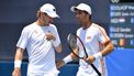 Netherlands' Jean-Julien Rojer (R) and Netherlands' Wesley Koolhof talk during their Tokyo 2020 Olympic Games men's doubles first round tennis match at the Ariake Tennis Park in Tokyo on July 24, 2021. 
Tiziana FABI / AFP