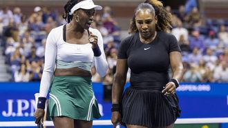 USA's Serena Williams (R) and Venus Williams confer as they play against Czech Republic's Lucie Hradecka and Linda Noskova during their 2022 US Open Tennis tournament women's doubles first round match at the USTA Billie Jean King National Tennis Center in New York, on September 1, 2022. 
COREY SIPKIN / AFP