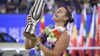 Belarus' Aryna Sabalenka poses with the trophy after winning the women's singles final against China's Zheng Qinwen at the Wuhan Open tennis tournament in Wuhan, China's Hubei province on October 13, 2024.
 
WANG Zhao / AFP