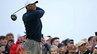 US golfer Tiger Woods watches his drive from the 4th tee during his second round, on day two of the 152nd British Open Golf Championship at Royal Troon on the south west coast of Scotland on July 19, 2024. 
Paul ELLIS / AFP