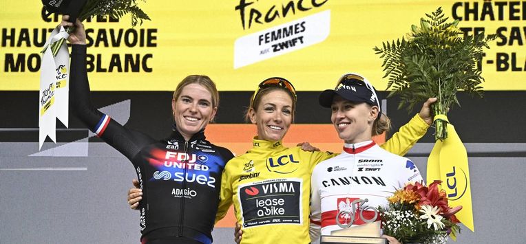 (From L) Second-placed FDJ-SUEZ team's Dutch rider Demi Vollering, overall winner Team Visma | Lease a Bike's French rider Pauline Ferrand-Prevot and third-placed Canyon//SRAM Racing team's Polish rider Katarzyna Niewiadoma celebrate on the podium after the 9th and last stage of the fourth edition of the Women's Tour de France cycling race at the end of the 9th and final stage (out of 9) 124.1 km from Praz-sur-Arly to Chatel, in Chatel, eastern France on August 3, 2025. 
JULIEN DE ROSA / AFP