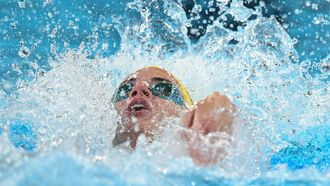 Australia's Kaylee McKeown competes in the final of the women's 4x100m medley relay swimming event during the Paris 2024 Olympic Games at the Paris La Defense Arena in Nanterre, west of Paris, on August 4, 2024. 
Oli SCARFF / AFP