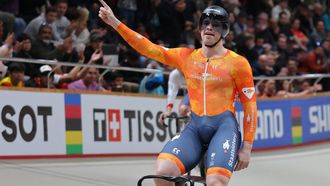 Netherlands' #168 Harrie Lavreysen celebrates after winning the men's keirin final event of the 2025 UCI Track World Championships at the Penalolen Velodrome, in Santiago, on October 23, 2025. 
Javier TORRES / AFP